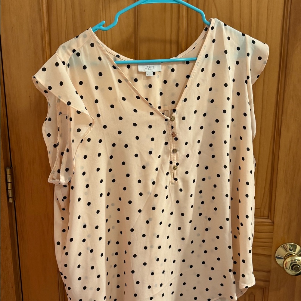 Blush colored polka dot shirt